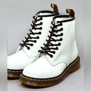 White patent docs. In good condition. But worn.